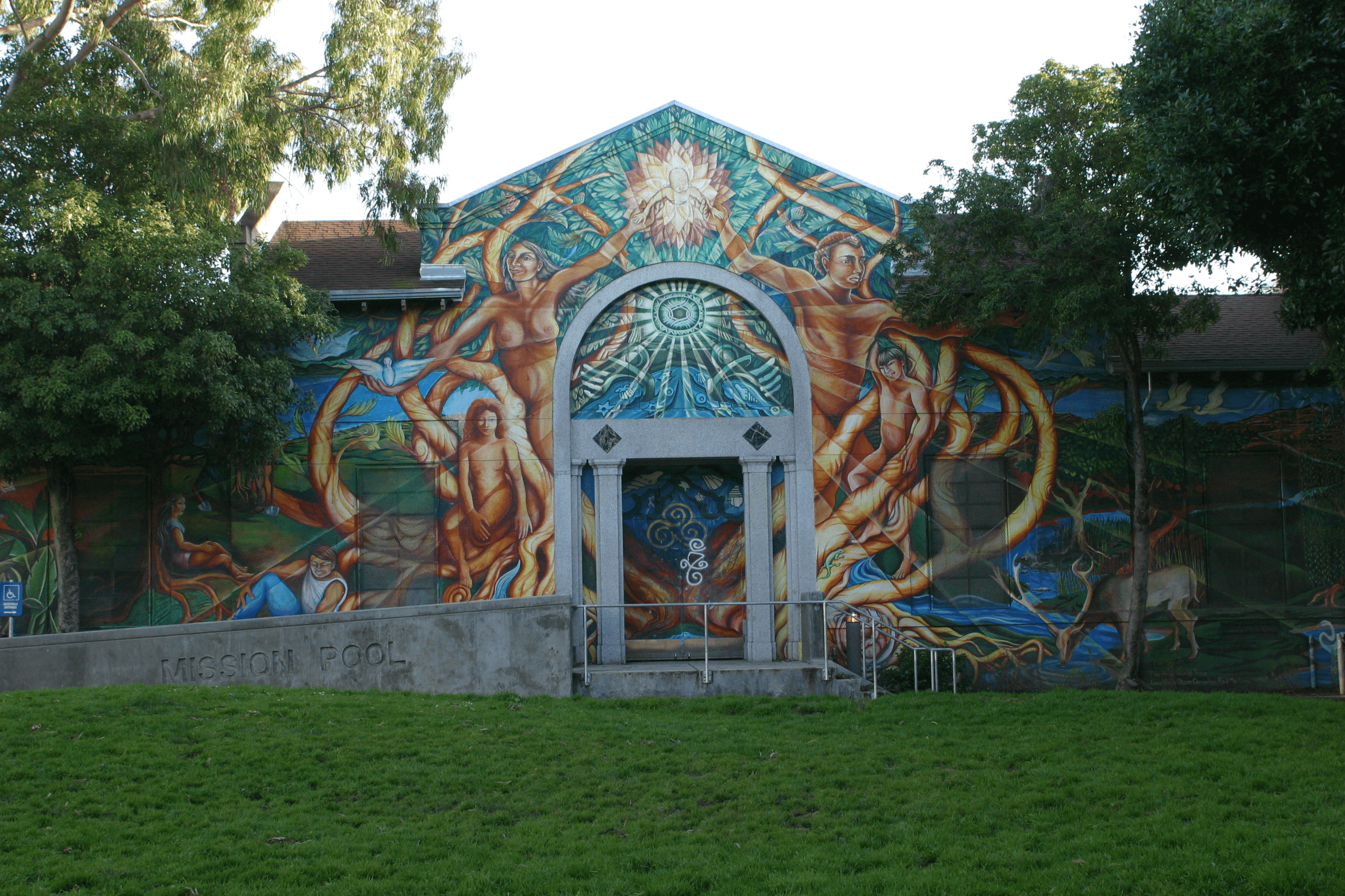 NEW WORLD TREE, Mission Pool Mural, 70' x30' acrylic paint on stucco, Juana Alicia, Susan Cervantes and Raul Martinez, 1987