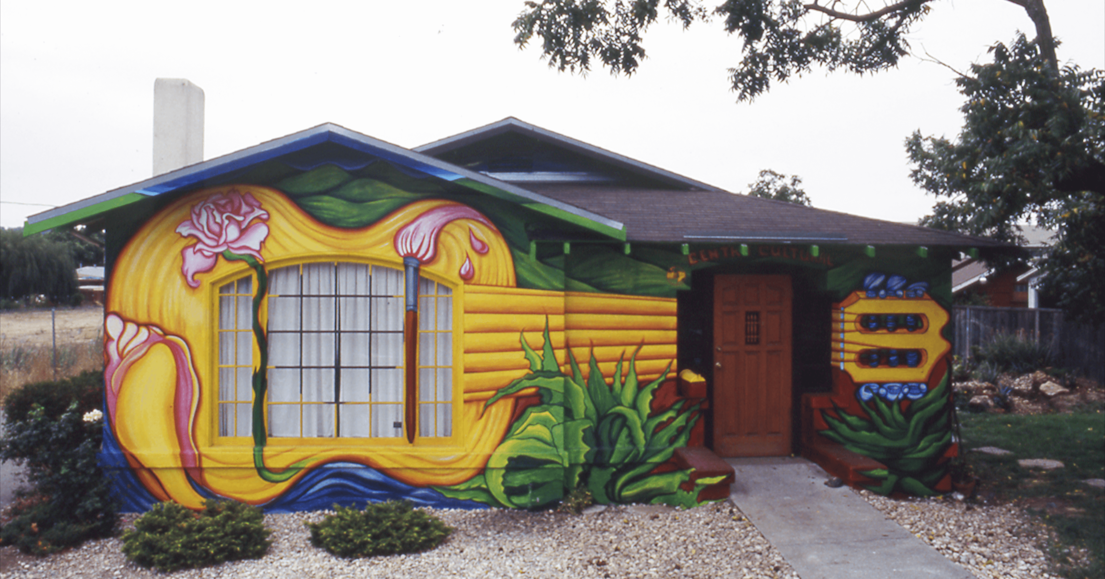 CULTURA SIN FRONTERAS • CULTURE WITHOUT BORDERS, Novato Hispanic Cultural Center mural, 30' x15'. Acrylic on stucco, designed and executed with student artists Concha Marina Aparicio, Rosario Alcazar and Julia Coyne, Novato, California, 1988